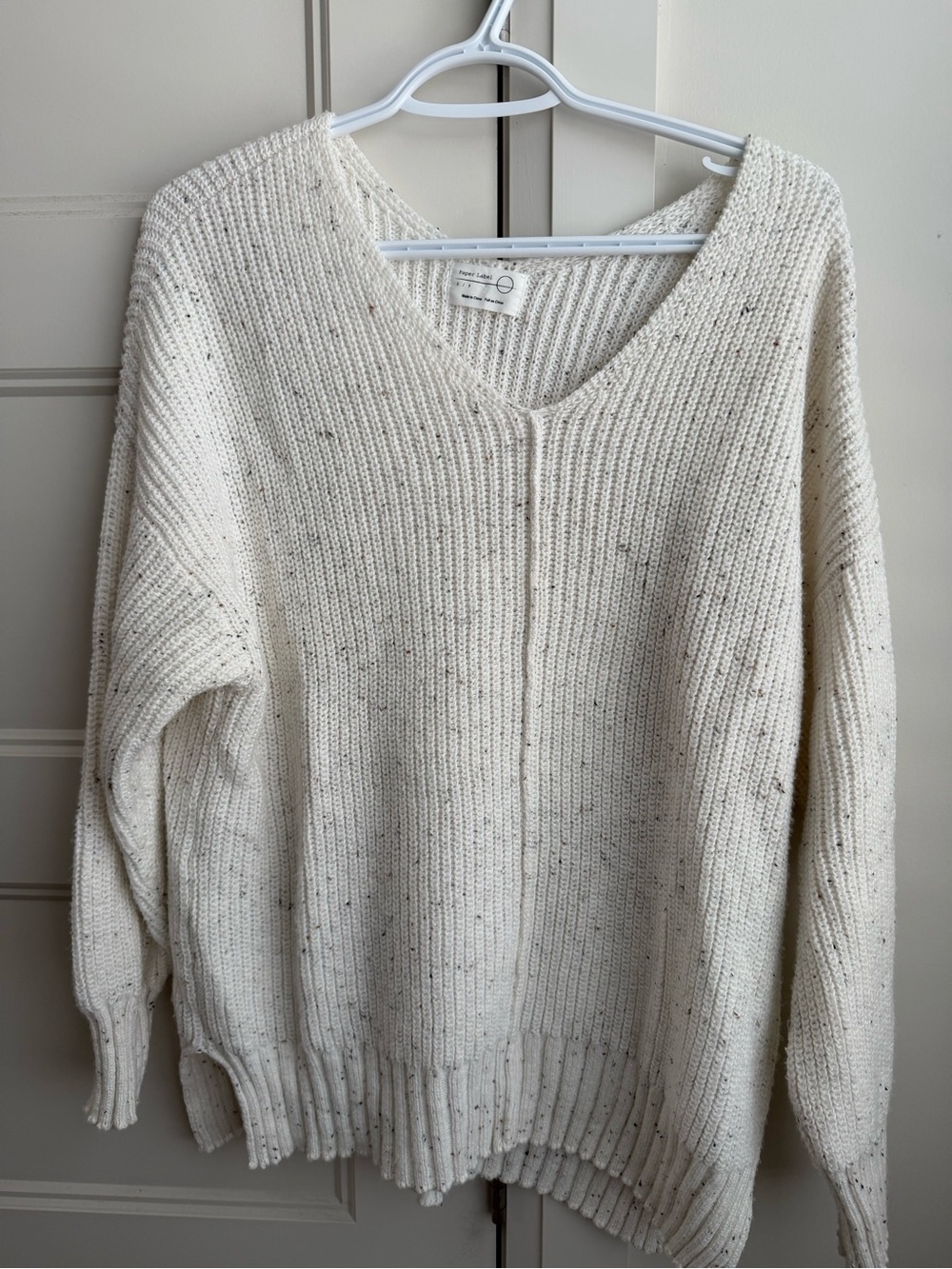 Paper Label’s Cozy Ivory V-Neck Knit Sweater